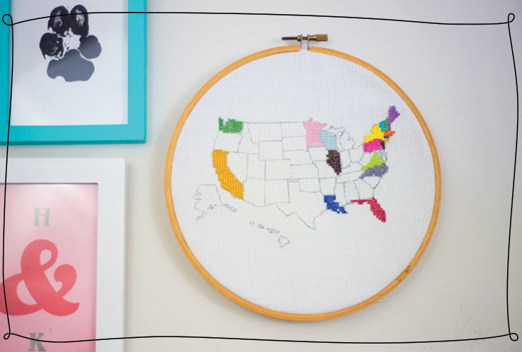 Embroidered map of the United States with states filled in with colored thread 